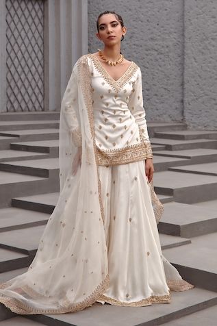 Buy White Embroidery V Neck Kurta Sharara Set For Women by Angad Singh Online at Aza Fashions. Garara Dress, V Neck Kurta, Sharara Designs, Ethereal Elegance, Desi Dress, Floral Frocks, Trendy Outfits Indian, Desi Fits, Traditional Indian Dress