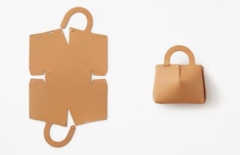 Nendo partners with UP TO YOU ANTHOLOGY on a new handbag design that's made from a single piece of laser-cut leather. Nendo Design, Sac Diy, Leather Bag Pattern, Diy Leather Bag, Laser Cut Leather, How To Make Handbags, Leather Projects, Leather Bags Handmade, Leather Pattern