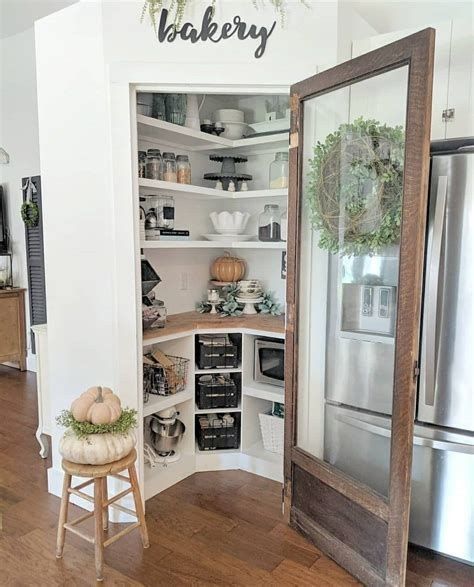 13 Walk-in Corner Pantry Ideas for Small Kitchens - GoTinySpace Walk In Pantry Small Spaces, Walk In Pantry Wall Ideas, Fridge Stove Pantry Wall, How To Build Corner Pantry, How To Add Pantry To Small Kitchen, Transform Small Pantry, How To Create Pantry In Small Kitchen, Corner Pantry Build, Open Corner Pantry