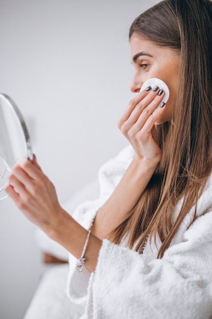 Free photo woman with mirror removing ma... | Free Photo #Freepik #freephoto #skin-care #facial-mask #beauty-care #facial-beauty Best Face Wipes, Sensitive Skin Routine, Foto Hotel, Summer Cosmetic, Skincare At Home, Facial Pictures, Upper Lip Hair, Pretty Tan, Cosmetic Clinic