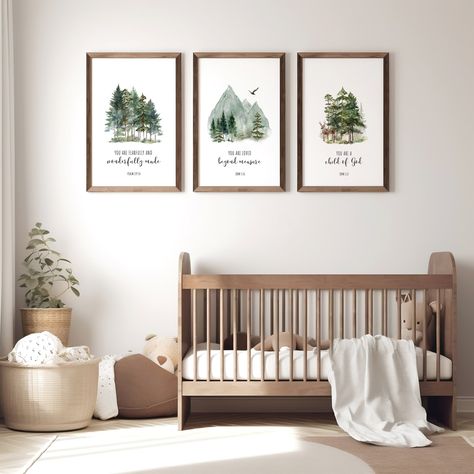 Very lovely Woodland Forest Mountain Nursery Decor, with Scripture Bible Verses to encourage and guide your little one. This set features a deer and flying bird. A Perfect Wall Art Set for a Gender Neutral New Baby Gift Set of (3) UNFRAMED Prints or Canvas. This collection of Mountain Nursery Prints showcases a serene watercolor forest and mountain scenery across three distinct prints. Each print is adorned with a meaningful Bible scriptures for your child. The color palette consists of assorted Forest Adventure Nursery, Native American Nursery Theme, Emerald Green Nursery Gender Neutral, Themes For Nursery, Tree Themed Nursery, Cozy Nursery Ideas Gender Neutral, Outdoorsy Nursery Gender Neutral, Dark Green Nursery Gender Neutral, Baby Boy Forest Nursery