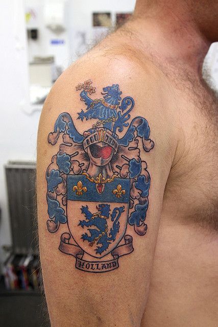 Crest Tattoo Coat Of Arms Tattoo, Family Crest Tattoo, Shoulder Armor Tattoo, Tattoo Placement Arm, Crest Tattoo, Shield Tattoo, Armor Tattoo, Small Forearm Tattoos, Tattoos Meaning