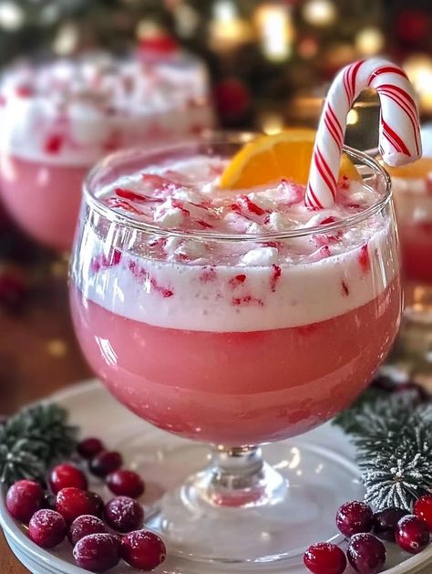 Candy Cane Christmas Punch Candy Cane Shooters, Spiked Punch Bowl Recipes, Strawberry Ice Cream Punch, Candy Cane Punch Recipe, Candy Cane Alcoholic Drink, Christmas Batched Cocktails, Santa’s Hat Shirley Temple Mocktail, Candy Cane Punch, Christmas Drinks Alcohol Recipes Punch