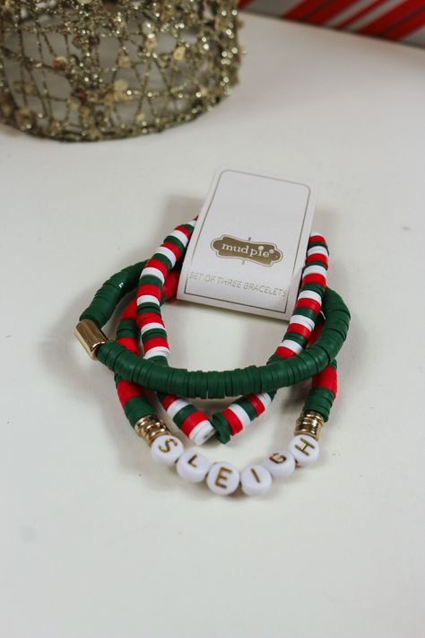 Embrace the festive season with our Christmas Holiday Beaded Bracelets! Available in 3 vibrant colors, these bracelets add a touch of holiday cheer to any outfit. Handcrafted with exquisite beads, each bracelet is a unique statement piece. Perfect for spreading joy and gifting to loved ones! Christmas Beaded Bracelets Ideas, Christmas Bracelets Clay Beads, Holiday Bracelet Ideas, Christmas Bracelet Ideas String, Seed Bead Christmas Bracelets, Christmas Jewelry Diy Bracelets, Cute Christmas Bracelets, Winter Clay Bead Bracelets, Christmas Clay Bead Bracelet Ideas