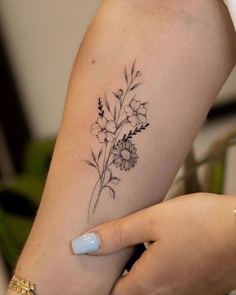 Flower Tattoos Feminine, 2 Birth Flowers Tattoo, Small Hip Bone Tattoos Women, Black And Gray Wildflower Tattoo, Simple But Elegant Tattoos, Linework Tattoo Flower, Daffodil And Chrysanthemum Bouquet Tattoo, Tattoo Ideas With Meaning Inspiration, Fine Line Wildflower Bouquet Tattoo