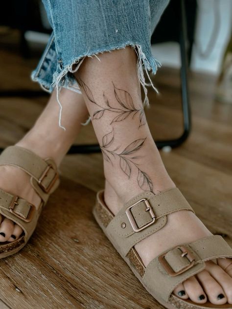 Ankle Vine Tattoos For Women, Vine Tattoos Ankle, Leaves Bracelet Tattoo, Woman Thigh Tattoos Unique, Ankle Flower Tattoo Wrap Around, Vine Tattoo Forearm, Feet Tatoos Woman, Floral Ankle Tattoo Wraps, Ankle Wrap Around Tattoo