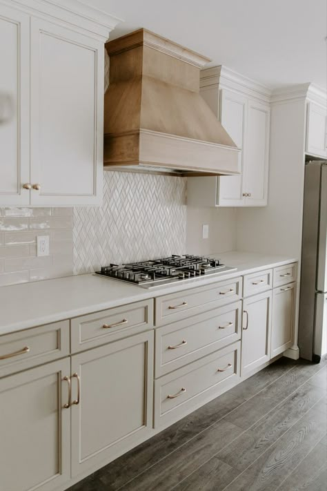 Classic natural kitchen: olive cabinets, stovetop, and wood-stained range hood. Olive Cabinets, Modern Kitchen Hood, Kitchen Hood Ideas, Olive Kitchen, Kitchen Hood Design, Earthy Modern, Kitchen Vent Hood, Kitchen Vent, Job Well Done