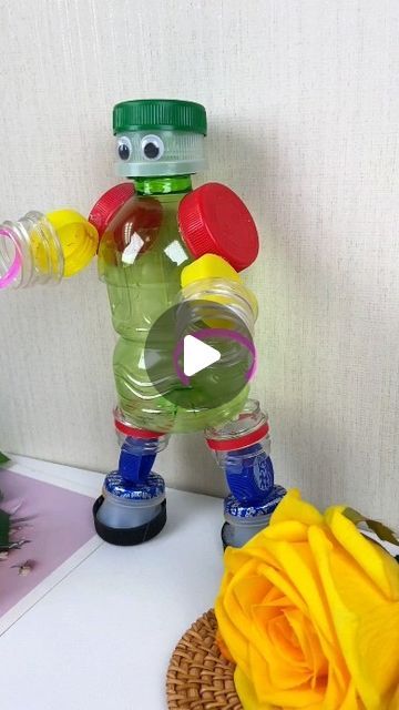 paper crafts creator on Instagram: ""Turn Bottle Caps into a Handmade Robot: A Fun Summer Project" Hashtags:#TurnWasteIntoTreasure #ParentChildHandicraft #HandmadeDIY #WasteUtilization #UpcycledCrafts #EcoFriendlyProjects" Recycle Robot Project Ideas, How To Recycle Plastic Bottles, Robot Project Ideas, Recycled Materials Art Projects, Bottle Caps Crafts, Handmade Robot, Plastic Bottle Cap Crafts, Recycling Activities For Kids, Robot Project