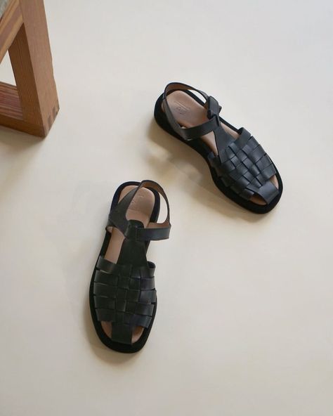 Two black fisherman sandals sit side by side on a white floor. A wooden chair leg is seen in the corner. Fisherman Sandals, Black Leather Sandals, Clean Shoes, Goat Leather, Fall Shoes, Ankle Strap Heels, Velcro Straps, Strap Heels, Recycled Paper