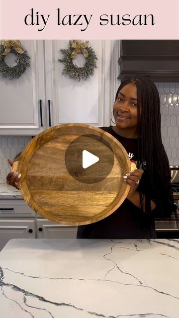 Nneka Mosley | DIY & Design + Lifestyle | PA on Instagram: "Okay yall did you know you can turn any wood platter you already have into a lazy susan? I got this inexpensive turntable from Amazon and screwed it on to this wood tray I already had then added some felt tabs to the bottom. And walah ... lazy susan!  And since it’s the holidays I decided to do a breakfast treat tray. I am aware it isn’t the healthiest breakfast tray...but it’s the holidays...so why not!?  I started off making this easy donut hole tree ...takes a little time but it’s worth it. All you need are donut holes (I used 2 boxes of @entenmanns Donut Holes), toothpicks, 12” styrofoam tree, and plastic wrap. I also added some raspberries to fill in the gaps. Then I added a few other breakfast items to the tray and it was do Lazy Susan Decorating Ideas On Counter, Lazy Susan Charcuterie Board, Lazy Suzanne Ideas, Lazy Susan Ideas Table Top, Lazy Susan Ideas Table Top Decor, Lazy Susan Decorating Ideas, Lazy Susan Decorating Ideas On Table, Donut Hole Tree, Diy Lazy Susan Turntable