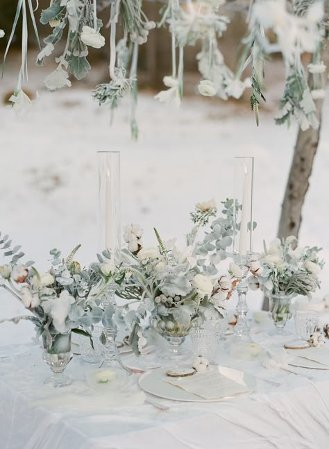 A neutral winter bridal shoot in the Dolomites via Magnolia Rouge Winter Wonderland Flowers, Winter Wedding Arches Indoor, Branch Centerpieces Wedding Winter, Winter Wonderland Wedding Ideas, Themes For Weddings, Winter Floral Installation, Winter Wedding Floral Installation, Winter Wedding Venue Snow, Winter Reception