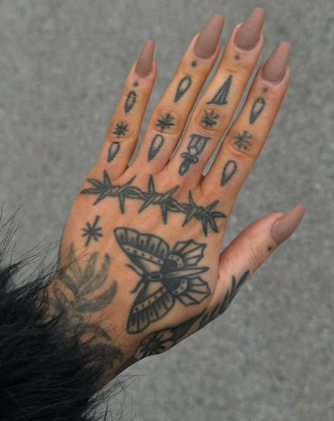 Finger Tats Women, Butterfly Hand Tattoo Traditional, Girly Knuckle Tattoos, Trad Fingers Tattoo, Wrist Thumb Tattoo, Nail Bed Tattoo, Woman’s Finger Tattoos, American Traditional Nail Tattoo, American Trad Hand Tattoo