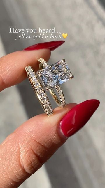 Gold Wedding Rings Radiant, Radiant Cut Rings Engagement, Gold Rectangle Engagement Ring With Band, Vintage Radiant Engagement Rings, Gold Big Engagement Rings, Gold Band Silver Engagement Ring, Radiant Cut Ring With Band, Classy Gold Engagement Ring, Rectangle Engagement Ring With Hidden Halo