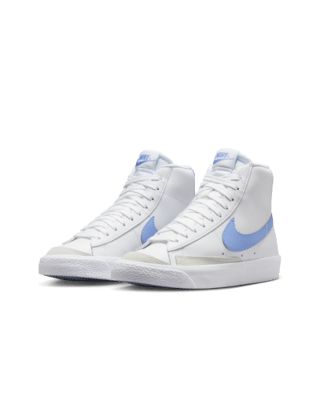 The Nike Blazer Mid '77 channels the old-school look of Nike basketball with a vintage midsole finish. Throwback style with modern materials means you can run, skip and jump in comfort. Shown: White/Royal Pulse Style: DA4086-123 Colorful Nike Blazers, Nike Blazer Blue, Simple White Dress, Nike Blazers, Nike Blazer Mid 77, Tenis Nike, Nike Blazer Mid, Christmas Gift List, Cute Nikes