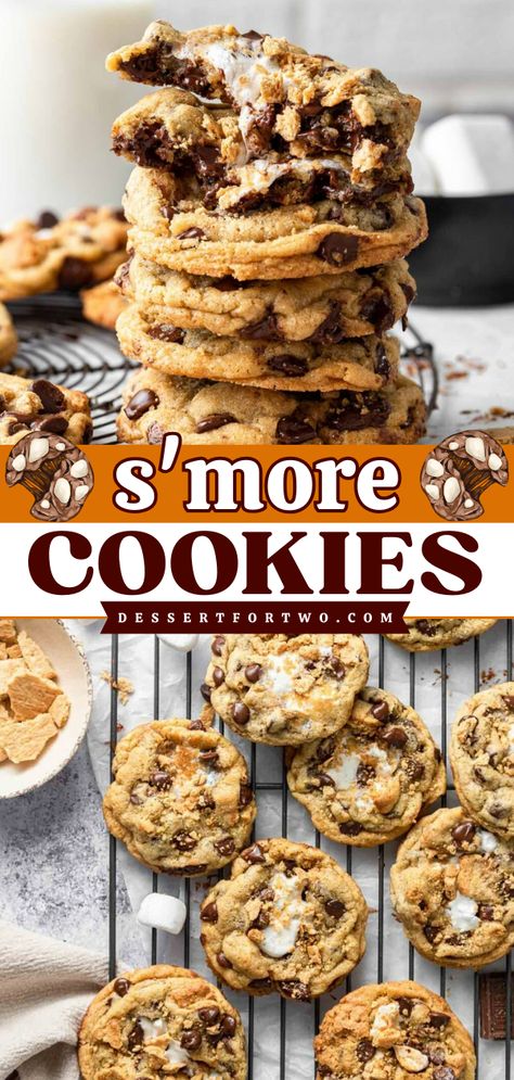 When we take an incredible recipe for gooey, soft chocolate chip cookies and stuff them with marshmallows and sprinkle them with graham cracker crumbs, we get Smores Cookies! This cookie recipe is the only one you need for the summer; everyone loves them. S’mores Cookies Recipe Easy, Homemade Smores Cookies, Unique Smores Recipes, Easy S’more Cookies, Campfire Cookies Recipes, S’mores Cookies Easy, Peanut Butter Smores Cookies, Brown Butter Smores Cookies, Sourdough Smores Cookies