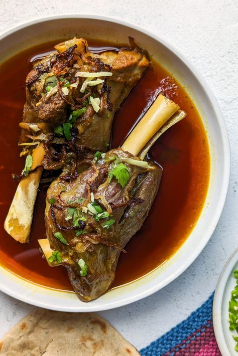 Nalli Nihari – Prepare homestyle Pakistani nalli nihari by simmering lamb shanks with homemade nihari masala and aromatics for a soothing comfort meal that’s perfect for special gatherings and cozy … The post Nalli Nihari appeared first on Jamil Ghar. Non Veg Food Indian, Pakistani Food Photography, Indian Traditional Food, Nalli Nihari, Hyderabadi Food, Maharashtra Food, Pakistani Food Recipes, Pakistani Foods, Nihari Recipe