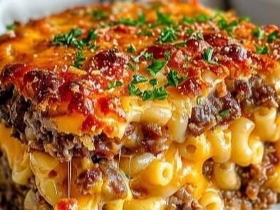 Cheesy Mac and Cheese Meatloaf Casserole Recipe – Easy, Delicious Comfort Food - NewsBreak Mac & Cheese Meatloaf Casserole, Meatloaf Mac And Cheese Casserole, Mac And Cheese Meatloaf Casserole, Cheeseburger Meatloaf Recipes, Cheese Meatloaf, Meat Casseroles, Cheese Stuffed Meatloaf, Mozzarella Sticks Recipe, Meatloaf Casserole