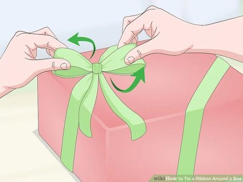 3 Ways to Tie a Ribbon Around a Box - wikiHow Ways To Tie A Ribbon, Ribbon On Presents, Christmas Present Ribbon, Christmas Present Bow, Bows For Presents, Package Bows, Fancy Ribbon, Ribbon Box, Fancy Bows