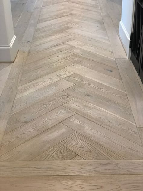 Chevron vs. Herringbone Wood Flooring - Decoholic Vinyl Flooring Herringbone Pattern, Luxury Vinyl Plank Flooring Herringbone Pattern, Haring Bone Flooring, Herringbone Wood Flooring, Plank Flooring Patterns, Herringbone Wood Floor Entryway, Large Herringbone Tile Floor, Rustic Vinyl Plank Flooring, Herringbone Vinyl Plank Flooring