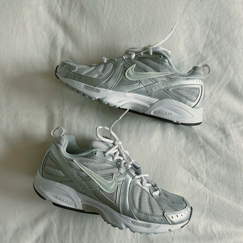 Silver Y2K Nike lifestyle sneakers Size 10W $40 Comment “I want it” or dm me if you would like to buy these shoes 🤍 Retro Nike Shoe, Nike Vintage Shoes, Retro Nike Shoes, Vintage Nike Shoes, Nike Lifestyle, Vintage Mood Board, Silver Y2k, Pretty Sneakers, Y2k Shoes