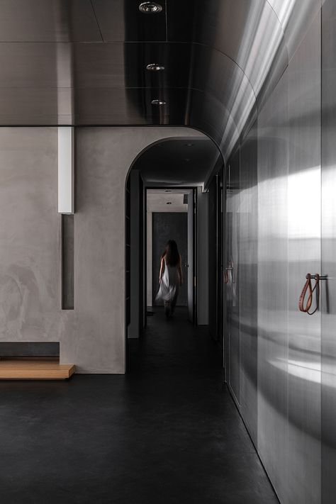 stainless steel wall reflects daily life within minimalist interior by studioX4 in taipei Steel Architecture, Concrete Effect Paint, Corridor Design, Concrete Interiors, Minimal Living, Apartment Renovation, Sopot, Steel House, Dental Office