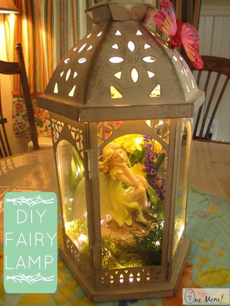 DIY Fairy Lantern Lamp Tutorial : After I made a LEGO themed lamp for my son a few weeks ago my daughter felt left out, and she asked me if I could make her a lamp too. Her room is completely decked out in Disney Fairies at the moment (right down the Tinkerbell themed television). After thinking on it for a few days, I came across a lantern display at A.C. Moore .... Fairy Lantern, Fairy Lanterns, Lantern Ideas, Fairy Jars, Fairy Crafts, Fairy Decor, Garden Lanterns, Fairy Lamp, Fairy Garden Houses