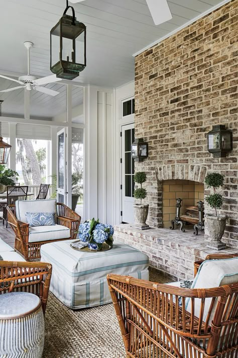 enclosed porch with brick fireplace and lantern lighting Southern Living Idea House, Southern Home Decor, Screened Porch Designs, Porch Fireplace, Southern Living Magazine, Southern Living Homes, Southern Homes, Screen Porch, Amelia Island