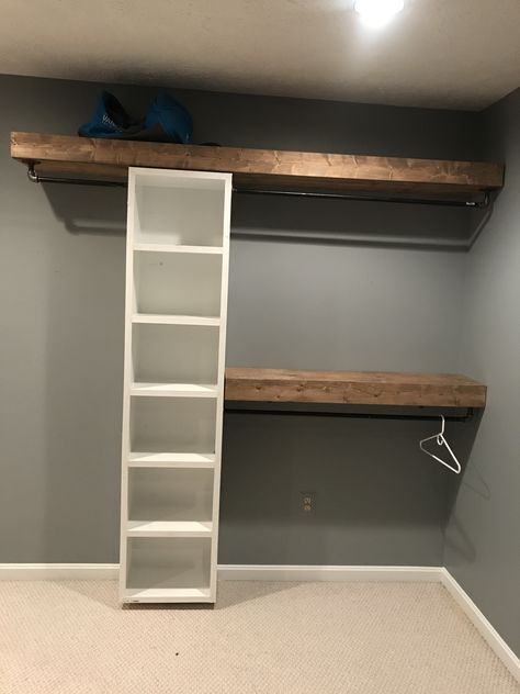 I built floating shelves for an open closet system. Floating Shelves Bedroom For Clothes, Floating Clothing Shelves, Ideas For A Room With No Closet, Walk In Closet Floating Shelves, Floating Shelves For Clothes, Small Room With No Closet Ideas, Weird Shaped Closet Ideas, Floating Closet System, Diy Clothes Shelves