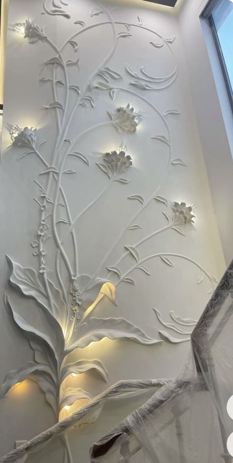 Wall Plaster Designs, Plaster Wall Art Murals, Wall Painting Ideas Bedroom Unique, Stairs Wall Design, Staircase Wall Art, Floral Staircase, Staircase Wall Decor, Stone Wall Design, House Interior Design Styles