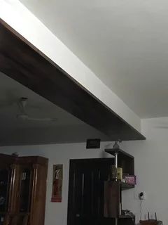 Ceiling ideas to cover this beam Living Room Support Beam, How To Cover Beams Ceiling Ideas, Beam Paneling Ideas, How To Hide Beams In Ceiling, False Beams Ceilings, Beam Covering Ideas Living Rooms, Support Beam Cover Ideas, Beam Covering Ideas, Wooden Ceiling Designs