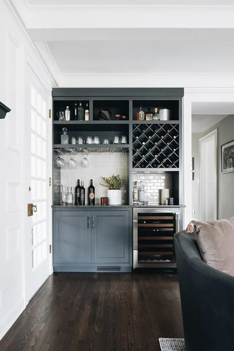 Gray living room bar features dark gray cabinets finished with a glass front wine fridge fixed beneath a black granite countertop. Built In Bar In Living Room, Bar In Living Room, Home Wet Bar, Home Bar Cabinet, Living Room Transitional, Home Bar Rooms, Modern Home Bar, Bar Sala, Bar In Casa