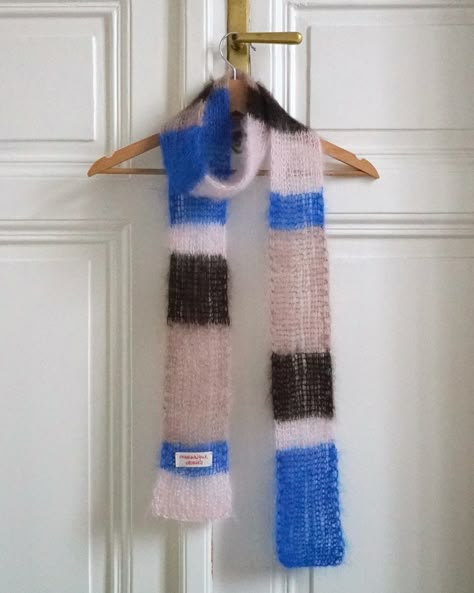 The ✨ DAZZLING SCARF ✨ “Wes Anderson” - pink/orange/blue/white “Twin Peaks” - red/black/blush/white “Blue Velvet” - blue/brown/pink/beige Brightens your mood with rhythmic color blocks 🪩 Hand knitting from mohair and silk, hand brushed for the dazzling fuzzy finish. About 2m long. 75% mohair, 25% silk 1890,- czk Available for custom orders as well 💫 Crochet Scarf Color Combinations, Long Knitted Scarf, Brown Knitted Scarf, Mohair Knit Scarf, Striped Knit Scarf, Mohair Crochet Pattern, Stripe Scarf Knit, Rachel Aesthetic, Scarf Knit Pattern