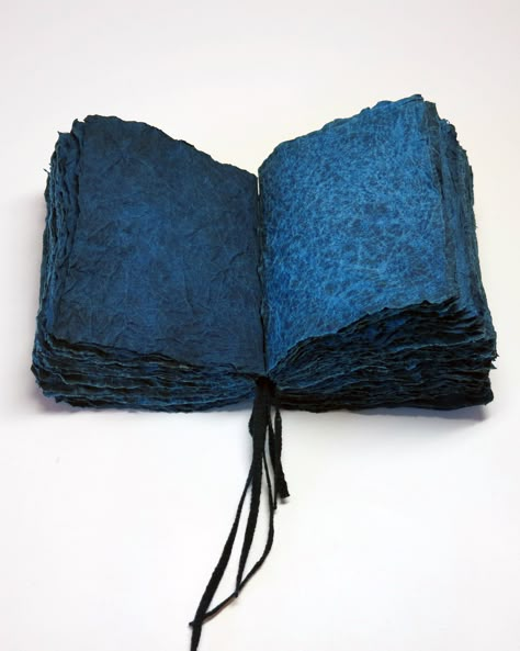 Handmade flax paper with indigo dye, konn’yaku paste, and momigami kneaded effect intended to give the look and feel of fabric. Simple all-along stitch over indigo dyed tapes. All cover papers handmade and hand-dyed by the artist. Momigami Projects, Momigami Paper Art, Artist Books Handmade, Artist Books Ideas, Handmade Book Covers, Dye Paper, Personalized Sketchbook, Indigo Dyeing, Coptic Stitch