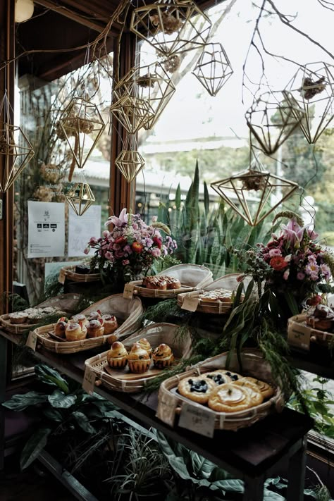 Crystal Cafe Aesthetic, Baking Witch Aesthetic, Forest Bakery Aesthetic, Witchy Pastries, Magical Cafe Interior, Bakery With Plants, Gothic Bakery Interior, Witch Bakery Aesthetic, Witchy Bakery Aesthetic