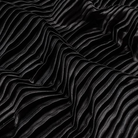 There's nothing shady about this Black Pleated Stretch Satin! Sporting a smooth and soft face, a modestly structured drape, and a fun accordion pleated design with a fair amount of stretch along the weft, it's ideal for A-line skirts, maxi skirts, empire dresses and more! Opaque in nature, a lining isn't needed but may be used in instances where additional structure is desired.  Please be aware that this collection of pleated fabrics is measured and cut with an open pleat. Brand Exploration, Mood Designer Fabrics, Garment Sewing, Soft Face, Black Drapes, Duchess Satin, Mood Fabrics, Color Palette Design, Empire Dress