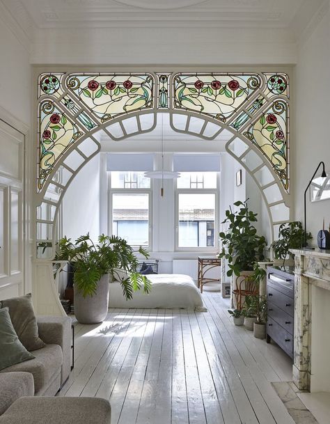 Bedroom, Bed, Pendant Lighting, and Painted Wood Floor "I like lamps with opal white and brass elements," Taeyman adds, who used lamps of different heights throughout the space. Photo 9 of 12 in An Antwerp Apartment Captures the Spirit of the Belle Époque زجاج ملون, Foyer Design, Diy Interior, House Goals, Architectural Digest, Design Case, Belle Epoque, My New Room, 인테리어 디자인