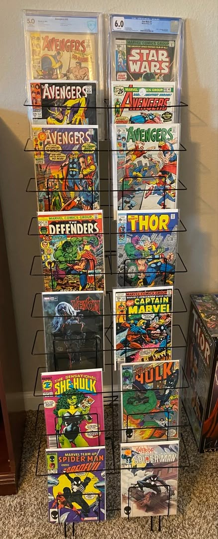 Displays2go | Customer Submitted Photos for Ideas & Inspiration! Magazine Display Ideas, Comic Collection Display, Comic Book Storage Ideas, Comic Book Display Ideas, Comic Room Ideas, Retail Displays, Comic Book Wall Display, Comic Book Organization, Magazine Display Rack