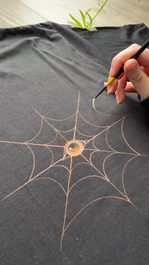 working on these shirts is my therapy 🕸️ | Instagram Diy Shirts Paint, Bleaching T Shirt Ideas, How To Draw On T Shirts, Drawing On T Shirt, Bleach Hoodie Designs Grunge, Bleach Art On Shirt, Bleached Sweater, Draw On Shirt, Drawing On Fabric