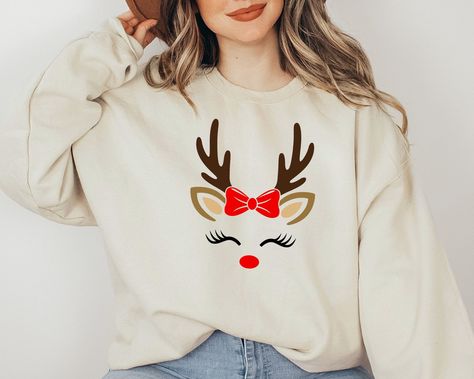 Christmas Sweatshirt, Reindeer Christmas Sweatshirt, Reindeer Face Sweatshirt, Reindeer Shirt for Woman, Christmas Shirt for Mama  ORDER INSTRUCTIONS  ➤ Check and review all listing photos. ➤ Pick up your item's size and color from drop down menus. ➤ Choose the quantity. ➤ Click "Add to Cart" button. ➤ Fill in the personalization box as recommended if provided.  ➤ You can go back to add more item or you can complete the checkout process. ➤ Click "Proceed to Check Out".  WHICH SIZE FITS ME BEST Reindeer Outfit Women, Reindeer Shirt Ideas, Reindeer Tshirts, Spirit Week School, Christmas Sweatshirt Ideas, Sweatshirt Ideas, Reindeer Shirt, Reindeer Face, Christmas Craft Fair