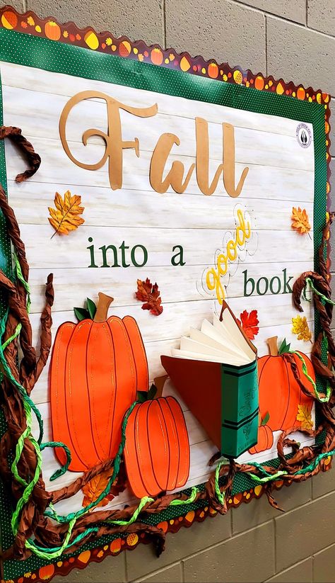 October Reading Bulletin Boards, Fall Into Books Bulletin Board, Pumpkin Library Display, Preschool Library Bulletin Board Ideas, Fall Decorations For Library, Fall Library Display Ideas, Fall Into Reading Bulletin Board, Fall Bulletin Board Ideas For Library, Fall Book Bulletin Board