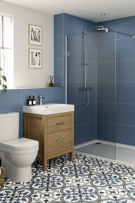 Turn your bathroom into a serene oasis with relaxing shades of blue 💙 Blue in the bathroom is a leading trend for 2023, often associated with calmness and relaxation, it's the perfect choice when looking to create a soothing atmosphere in your home. Our Misty Blue decor is available in our Large Tile, Herringbone & Metro Tile effects and Pure Collection. View our collections online: https://bit.ly/3riKzVu #MultipanelNewLaunch23 Blue Bathroom Walls, Blue Bathroom Tile, Small Bathroom Colors, Bathroom Paneling, Small Bathroom Interior, Bathroom Wall Panels, Shower Wall Panels, Small Bathroom Makeover, Large Tile