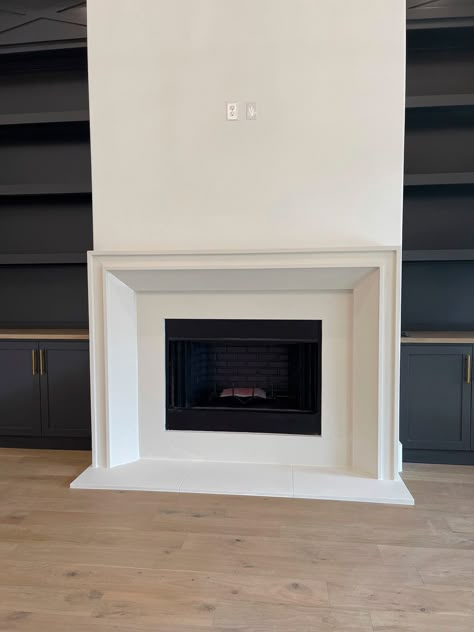 Fluted Cast Stone Fireplace, Modern White Mantle, Precast Fireplace Surround, Modern Cast Stone Fireplace Surround, Minimal Fireplace Mantel, Noncombustible Fireplace Mantel, Plaster Fireplace With Hearth, Cast Stone Fireplace With Raised Hearth, Vintage Modern Fireplace