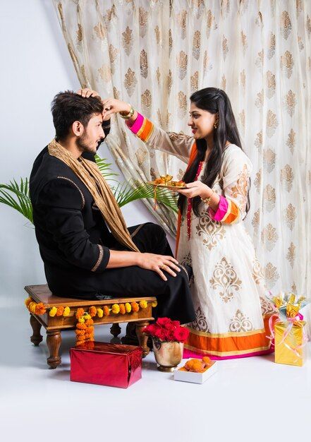 Indian young brother and sister celebrat... | Premium Photo #Freepik #photo #bhai #rakshabandhan-background #rakshabandhan #raksha-bandhan Bhai Dooj Photo, Rakshabandhan Background, Indian Brother And Sister, Brother Sister Photos, Rakhi Festival, Bhai Dooj, Taking Selfie, Album Artwork Cover Art, Cute Sister