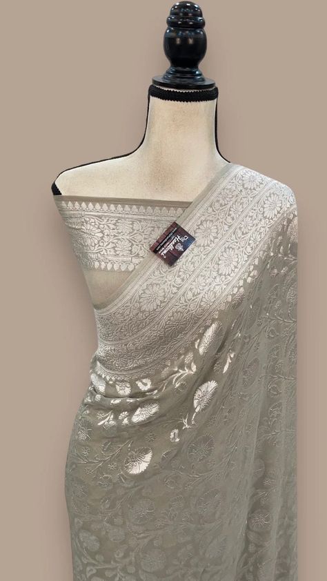 Ivory Khaddi Georgette Banarasi Saree with all silver zari jaal work Silver Banarasi Saree, Benarasi Saree Georgette, Banarasi Chiffon Saree, Silver Saree, Banarasi Georgette Saree, Khaddi Georgette Banarasi Saree, Khadi Banarasi Georgette Saree, Saree Inspiration, Khaddi Georgette Saree