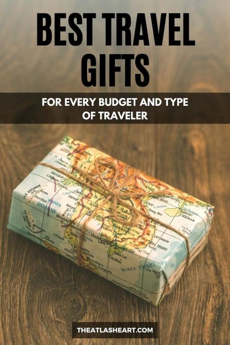 A small package wrapped in a map as wrapping paper and brown string, with the text overlay, "Best Travel Gifts." Travel Agency Gift Ideas, Bridesmaid Travel Gifts, Travel Gift For Boyfriend, Gifts For Boyfriend Going Abroad, Surprise Trip Reveal Ideas For Boyfriend, Travel Gift Box Ideas, Diy Gift For Traveler, Traveling Gift Ideas, Gift For Traveling Friend