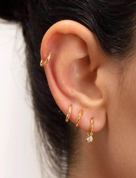 Our non tarnish gold vermeil CZ charm sleeper hoop earrings are the perfect everyday addition to your ears. Also choose from Sterling Silver too! ♥️ Real Gold-Plated Sterling Silver (Vermeil) Hoops ♥️ Choose your charm (heart or star) ♥️ Hypoallergenic ♥️ The perfect, everyday hoops ♥️ Choose your size ♥️ 1.2mm thickness ♥️ Small and Easy to put in ♥️ Free gift bag included, ready for gifting straightaway  This listing is for 1 hoop earring, if you need a pair please buy 2  For any more question Three Earlobe Piercings, 3rd Ear Piercing Ideas, 3 Lobe Piercings Ideas, Three Lobe Piercings, Triple Lobe Piercing, 3 Lobe Piercings, 4 Piercings, 3 Ear Piercings, Minimalist Ear Piercings