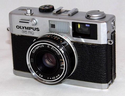 https://flic.kr/p/XoxJr4 | Vintage Olympus 35RC 35mm Rangefinder Camera, Made In Japan, A Very Compact Rangefinder Camera, Circa Early 1970s | Auction Item 171 - To be auctioned by Cledis Estes Auctions II in Medina, Ohio. 35 Mm Camera, 60s Camera, Olympus 35rc, 70s Camera, 1970s Camera, 70s Items, Vlog Camera, Expensive Camera, Medina Ohio