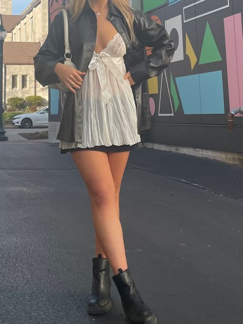 Leather Jacket With Mini Dress, Mini Skirt Big Jacket Outfit, Summer Dress With Leather Jacket, Leather Jacket And White Dress, Leather Jacket Mini Dress, Feminine Leather Jacket Outfit, Mini Dress Leather Jacket Outfit, Denim Skirt Leather Jacket Outfit, Mini Dress And Jacket Outfit