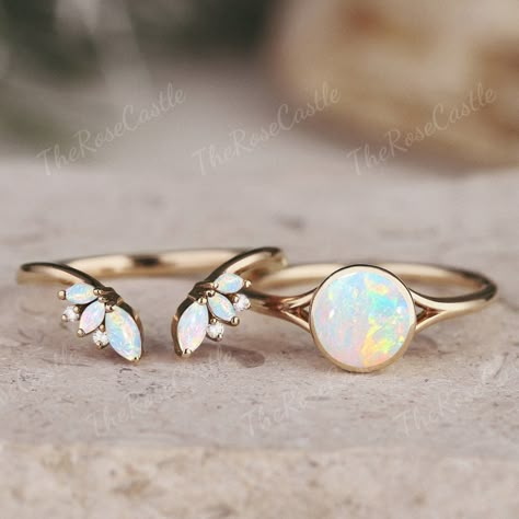 Unique Round Opal Engagement Ring Set Vintage Rainbow Opal Ring Art Deco Round Moissanite Diamond Gold Rings Opal Bridal Set Gift For Her ITEM DETAILS ●Available in yellow, white or rose solid 10k, 14k or 18k gold. This ring can be made in Platinum or sterling silver. ❀❀Center Stone: Natural opal Shape: Round shape Size: 6.5mm Band width: Around 1.5mm ❀❀Open wedding band Stones: Natural opal & Moissanite / Natural Diamond Shape: Marquise & Round shape Moissanite / Diamond Weight: About 0.01ct Cl Opal Engagement Ring With Wedding Band, Opal And Moissanite Engagement Ring, Dainty Opal Wedding Ring, Opal Sapphire Diamond Ring, Matching Opal Wedding Rings, Pink Tourmaline And Opal Engagement Ring, Luxury Adjustable Opal Ring Gift, Luxury Adjustable Opal Ring For Gift, Opal Rings Gold