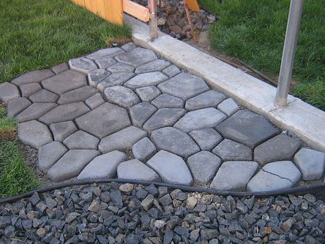 Concrete Cobblestone Path  We wanted to find something unique to use for our pathway and patio. We couldn't find anything we really liked. When I came across this concrete form from Lowes I was so excited. Not only does it look great but it was very cost effective.  To learn how we did it visit my blog at http://www.tancamjenksfam.blogspot.com/2011/... Small Yard Vegetable Garden, Small Yard Vegetable Garden Ideas, Path Floor Mould, Yard Vegetable Garden, Stepping Stone Pavers, Diy Hanging Chair, Paver Molds, Diy Path, Diy Driveway